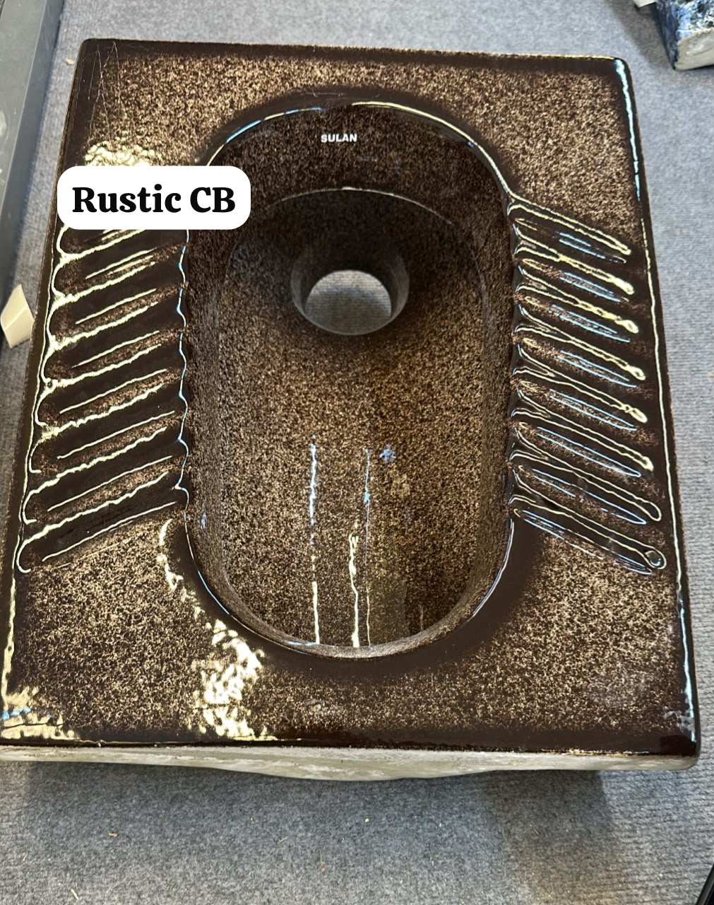 MARBLE SQUAT TOILET.